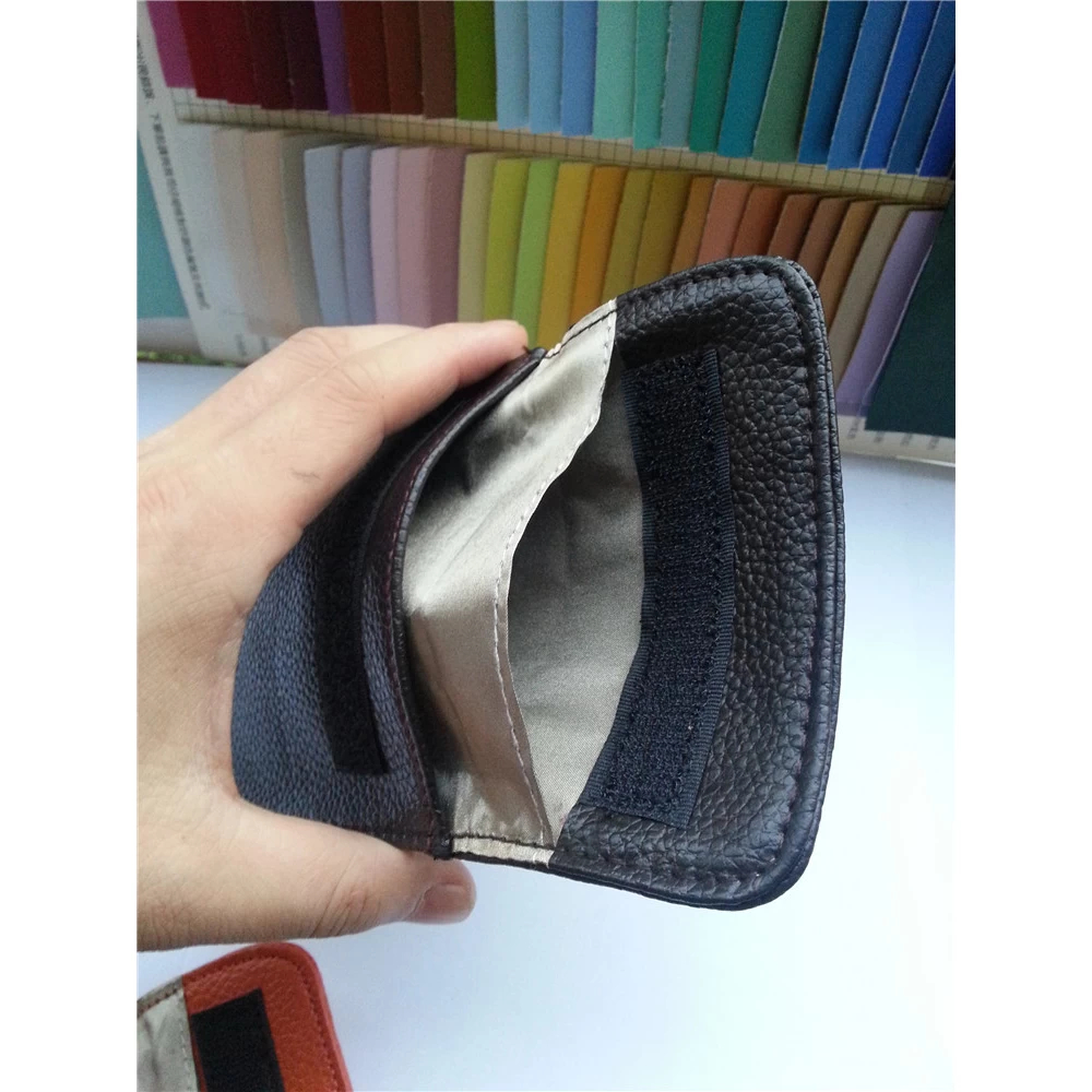 Wireless signal blocking case with hook and loop closure